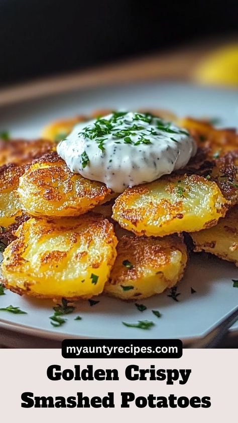 Discover how to make crispy smashed potatoes with the perfect crunch! This recipe pairs the irresistible texture of roasted potatoes with a zesty yogurt dip bursting with fresh herbs and citrus. Great for family dinners or entertaining, it’s a crowd-pleaser that’s both simple and packed with flavor. Get ready to elevate your potato game with this savory and satisfying dish! Potatoes For A Crowd, Garlic Yogurt, Potato Appetizers, Crispy Smashed Potatoes, Garlic Dip, Yogurt Dip, Smashed Potatoes, Baby Potatoes, Crispy Potatoes