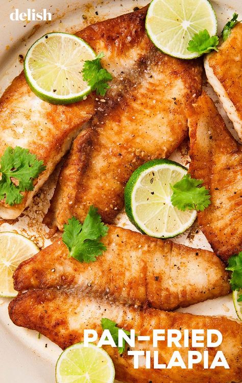 Here's how to make the BEST homemade tilapia in a flash. Get the recipe from Delish.com. #tilapia #fish #easy #seafood #healthy #panfried #flour #dinners #food Frying Tilapia Fish, Tilapia Fried Recipes, Tilapia Lime Recipes, Pan Fried Fish Recipes Tilapia, How To Fry Tilapia Fish, Fried Fish Talapia, Fried Fish Recipes Tilapia, Tilapia Recipes Fried, Pan Fried Tilapia Easy