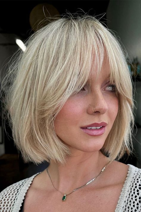 27. Soft Platinum Shaggy Bob Step into fall with this soft platinum shaggy bob, where laid-back meets effortlessly chic. This style features a slightly tousled, chin-length bob with wispy layers that add a touch of texture and movement. Caramel Lowlights, Trendy Fall Hair Color, Short Bob Styles, Textured Bangs, Fall Hair Color Ideas, Color Ideas For Blondes, Hair Color Ideas For Blondes, French Bob, Shaggy Bob