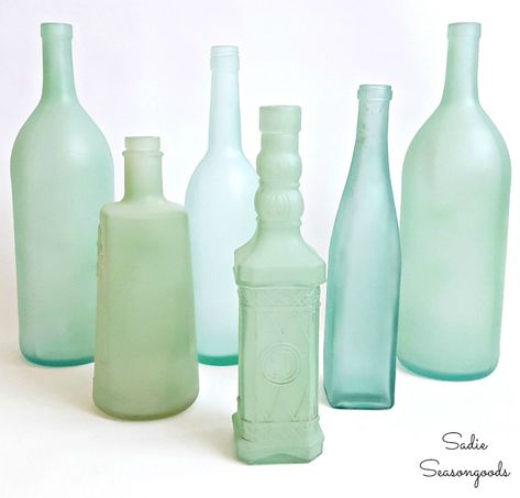 Sea glass bottles or sea glass decor from beach glass paint for wine bottle crafts by Sadie Seasongoods Sea Glass Bottles, Wine Flask, Sea Glass Decor, Indoor Crafts, Painted Glass Bottles, Empty Glass Bottles, Empty Wine Bottles, Glass Bottle Diy, Bottle Diy