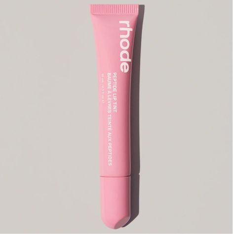 1 Rhode Peptide Lip Tint In The Shade Ribbon Beautiful Shade!! Brand New In Box! Sold Out Online. Meet Lip Tint. Sheer-But-Buildable Color That Melts Onto Lips For A Hint Of Tint And Rich, Glossy Finish. The Restorative, Fragrance-Free Formula Leaves Lips Naturally Plump, Hydrated, And Nourished From Within. Will Ship As Soon As I Receive From Rhode. Rhode Lip Tint, Lip Gloss Shades, Tinted Lip Balm, Makeup Gift, Lip Balm Gloss, Rhodes, Lip Tint, Lip Makeup, Fragrance Free Products