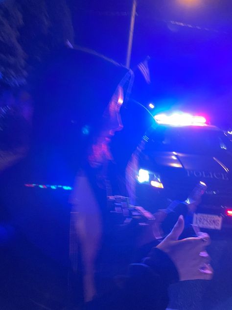 silhouette of two brunette girls in front of a police car during 4th of july. blue lighting Police Cars At Night, Police Cars Aesthetic, Cop Lights At Night, Cop Cars At Night, Pulled Over By Cop Night, Police Snapchat Story, Police Fake Story, Cops Aesthetic, Police Station Snap