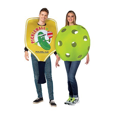 Pickle ball and paddle couples costume. Pickleball is a paddleball sport (similar to a racquet sport) combining elements of tennis, badminton, and table tennis. Two or four players use solid paddles made of wood or composite materials to hit a perforated polymer ball, similar to a wiffle ball, over a net. The sport shares features of other racquet sports: the dimensions and layout of a badminton court, and a net and rules somewhat similar to tennis, with several modifications. Pickleball was inv Ball Couple, Pickle Ball Paddle, Wiffle Ball, Paddle Ball, Couple Halloween Costumes For Adults, Couple Costume, Couples Costume, Pickleball Shirt, Pickle Ball