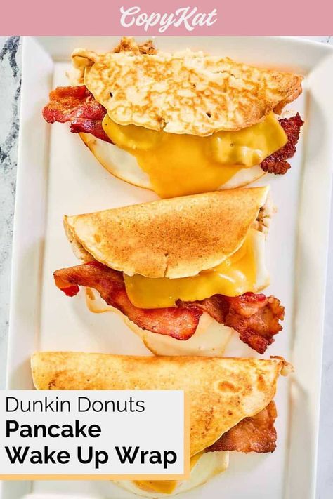 Dunkin Donuts Pancake Wake Up Wrap is a delicious breakfast of fried eggs, bacon, and cheese wrapped in a pancake. Get the easy copycat recipe and find out how to make the best pancake breakfast wrap to start your day in a tasty way. Enjoy this breakfast sandwich wrap anytime you have a craving. Bacon Egg Pancake Breakfast, Pancake Breakfast Sandwich, Wake Up Wrap, Pancake Wrap, Dunkin Donuts Recipe, Breakfast Wrap, Sandwich Wrap, Pancake Breakfast, Bacon And Cheese