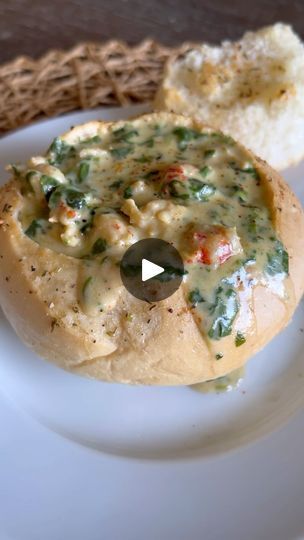 20K views · 158 reactions | Crawfish & Spinach Bread Boat 🦞 

Bon Creole has been a staple at Festival International, serving their famous bread bowls for as long as I can remember. If you try this recipe, let me know whatcha think!

Crawfish & Spinach Bread Bowl Recipe:

-1 1/2 sticks of butter
-2 tbsp minced garlic
-2 cups whole milk
-1 1/2-2 lbs of Louisiana crawfish tails
-16 oz frozen chopped spinach
-2 tbsp Britscookin Cajun seasoning
-1 tbsp lobster base (optional)
-1 1/4 cups heavy whipping cream
-Cornstarch slurry (3 tbsp cornstarch + 5 tbsp cold water)
-1 1/2 cups shredded Parmesan cheese
-Black pepper to taste

1. Melt 1/2 stick of butter in a Dutch oven over medium heat and sauté garlic for 3-5 minutes until fragrant.
2.Add the remaining butter, milk, crawfish tails, spinach, Spinach Bread Bowl, Creole Dishes, Crawfish Bread, Bread Boats, Spinach Bread, Bread Bowl Recipe, Cornstarch Slurry, Louisiana Crawfish, Butter Milk