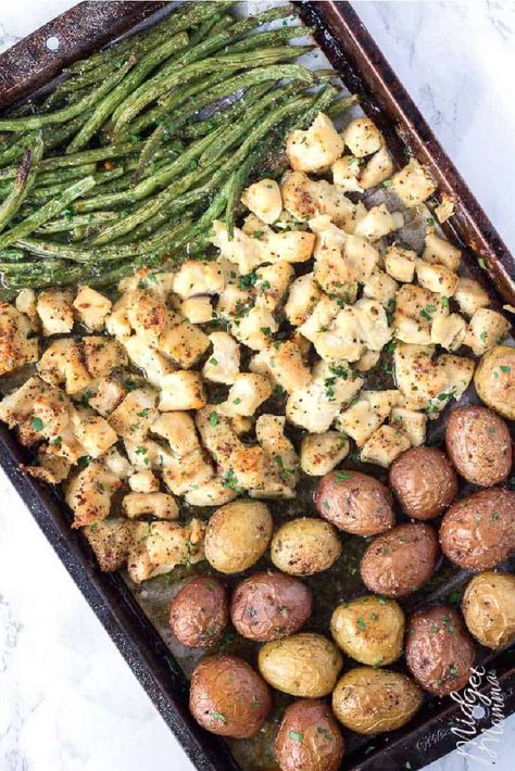 This one pan-baked chicken and veggies dinner is a perfect way to make an all in one meal that the whole family will love. Kids will love the flavorful chicken and potatoes, and you may even be able to get them to eat their green beans! Chicken And Veggies Dinner, One Pan Baked Chicken, Chicken Green Beans Potatoes, Pan Baked Chicken, Baked Chicken And Veggies, Veggies Dinner, Sheet Pan Meals Chicken, Chicken Green Beans, Sheet Pan Dinners Chicken