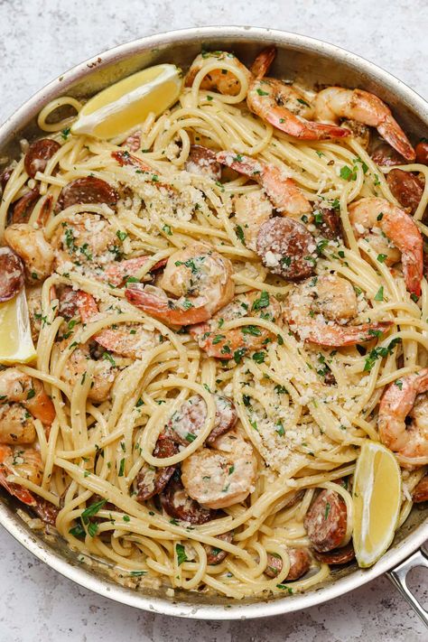 Our creamy Cajun shrimp pasta is an easy, flavorful weeknight meal. Made with homemade blackening blend and andouille sausage, it's packed with flavor! #wellseasonedstudio #cajunpasta #cajunshrimp #shrimppasta #blackenedshrimp Pasta With Andouille Sausage, Shrimp And Sausage Pasta, Creamy Cajun Shrimp, Creamy Cajun Shrimp Pasta, Healthy Pasta Dishes, Lemon Garlic Pasta, Cajun Shrimp Pasta, Shrimp Sausage, Cajun Pasta