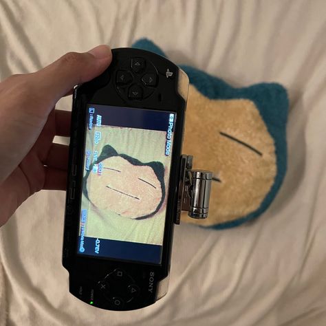 snorlax plushy psp camera Snorlax Aesthetic, Psp Camera, Psp Aesthetic, Skateboarding Tricks, Childhood Memories 2000, Vibe Aesthetic, Retro Gadgets, Water Type, Gaming Tech