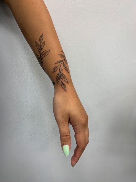 wrap around leaf tattoo, bracelet tattoo. Tattoo Wrap Around Wrist, Wrap Around Leaf Tattoo, Blatt Tattoos, Arm Wrap Tattoo, Wrap Around Wrist Tattoos, Around Arm Tattoo, Wrap Around Tattoo, Simple Arm Tattoos, Tattoos Simple