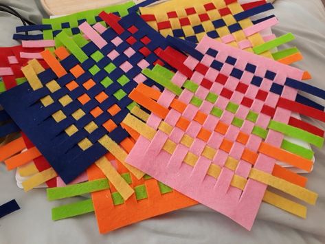 Felt weaving Weaving Activities For Kids, Weaving Preschool, Felt Weaving, Weaving Activities, Weaving Paper, Funky Fingers, Prop Box, Weaving For Kids, Placemats Kids