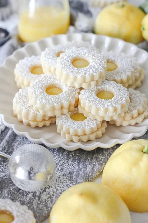 Lemon Curd Linzer Cookies - Baking with Blondie Lemon Curd Photography, Cookies Shapes Ideas, Lemon Curd Linzer Cookies, Sour Cream Lemon Curd Cookies, Lemon Curd Shortbread Cookies, Easy Linzer Cookies, Lemon Linzer Cookies, Lemon Custard Cookies, Lintz Cookies