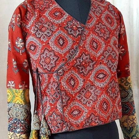 *AJRAKH DESIGNER BLOUSE* Finally the wait is over. As requested by most of you, posting our ready made designer blouse series ...🙏🏻 Style: AJARAKH Block printed blouse highlighted with contrast piping Material: cotton *Ajarakh* Size:- 36.38.40.42.44 Length :- 19" Sleev Lanth. 22👍 Lining :- Yes 👍🏻 📲My whatsapp link: https://wa.me/message/3Y7RY5UFGIOVO1 📞Please ping me @ 9️⃣9️⃣0️⃣3️⃣3️⃣7️⃣7️⃣7️⃣0️⃣8️⃣ Designer Blouse, Readymade Blouse, Contrast Piping, Ready Made, Printed Blouse, Block Print, Piping, Blouse Designs, Women's Top