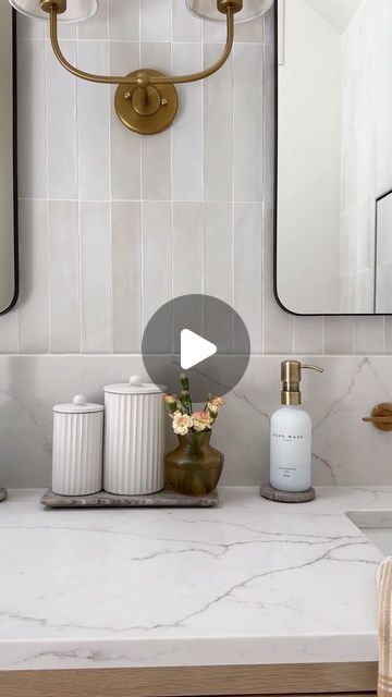 Bernice on Instagram: "okay if you were with me on stories while i was picking the wall tile for this bathroom, you know how QUICK i decided on this right when i saw it the first time - it was love at first sight 😍😄  the handmade, artisanal look and the variations in tone from tile to tile, along with the right amount of gloss was a perfect fit in this space. the way it complements the white oak vanities 🤌  it’s the Celine porcelain tile from @bedrosianstile ** (comment TILE for the exact links to the color/dimensions I have, to be sent to you. Note: if you’re not following me, the automated message may not go through or may be incomplete)   Grout used: Mapei Ultracolor Plus FA in Eggshell   **in partnership with Bedrosians Tile  #bathroomremodel #bathroomideas #bathroommaterials #befor Vanity Wall Tile Ideas, Vertical Tile Backsplash Bathroom, Bedrosians Celine Tile, Bathtub Tile Surround Ideas, Bathroom Subway Tiles, Subway Tile Bathroom Wall, Bathtub Tile Surround, Bathroom Backsplash Ideas, Subway Tile Bathroom