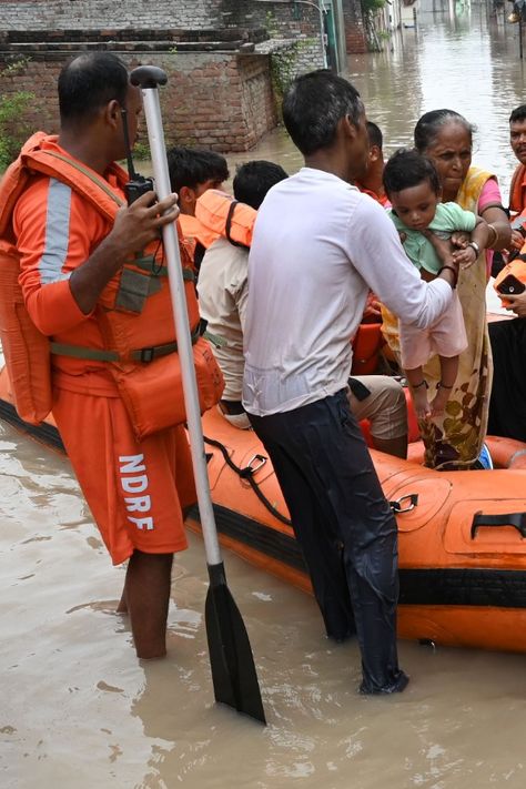 Teams from the National Disaster Response Force (NDRF) and the Indian Army have joined the relief operations in Delhi, which is experiencing one of its worst floods in many years."Labourers and engineers worked overnight to create a mud wall to stop the water (from entering the city). The Army and the NDRF have also joined the operation, so I believe we will be able to stop the water in the next three-four hours," Delhi Chief Minister Arvind Kejriwal said on Friday after inspecting the ongoin... Mud Wall, Disaster Response, River Bank, Indian Army, 45 Years, Supreme Court, Tent Camping, Earn Money, The City