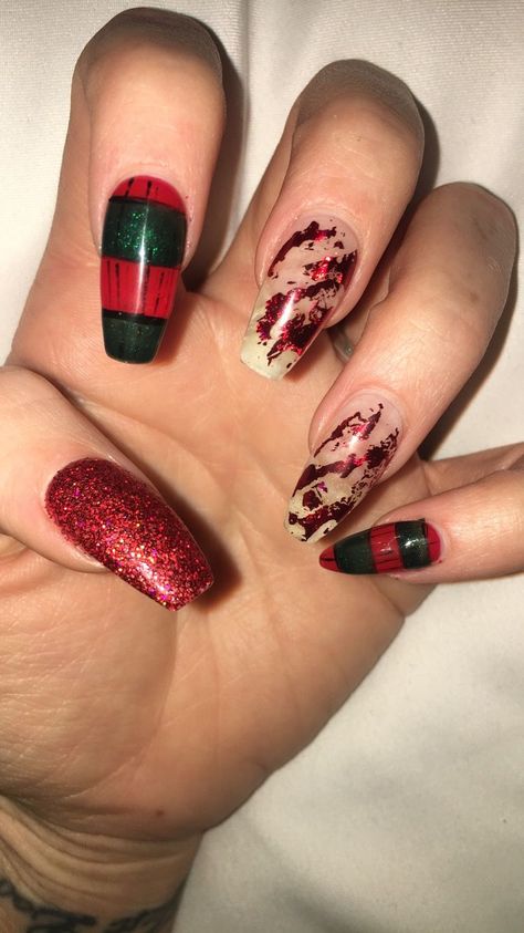 Halloween ready! Nightmare on Elm Street bc a Nightmare Before Christmas gets played out 🙄💚❤️🖤🔥🔥🔥 #freddykrueger #freddy #halloweennailart #halloweennails #nailart #nailartdesigns #horrorart #nailinspiration #nightmareonelmstreet #foil #rednails #holidaynails #naildesigns #nailsofinstagram Freddy Krueger Nail Art, Horror Theme Nails, Nightmare On Elm Street Party, Nightmare On Elm Street Nails, Nightmare On Elm Street Tattoo, Horror Themed Nails, Freddy Krueger Nails, Goth Acrylic Nails, Autumn Nails 2023