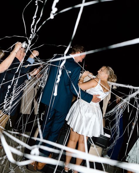 Candid Moments on a Wedding Day using streamers as a wedding exit Streamer Exit Wedding, Wedding Streamers Send Off, Streamers Wedding Send Off, Ribbon Wedding Exit, Bride And Groom Wedding Exit, Silver Streamer Wedding Exit, Wedding Exit, Wedding Exits, A Wedding