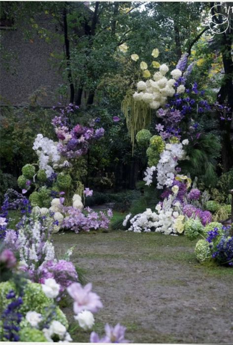 Pink Purple White Green Wedding, Unstructured Floral Arrangements Wedding, Purple Flower Installation, Green And Purple Flower Arrangements, Purple Arch Wedding, Wedding Arch Flowers Purple, Purple Green And White Wedding, Wisteria Chuppah, Wisteria Wedding Arch