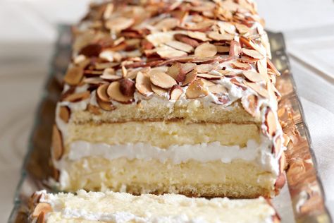 German Bee Sting Cake, Bee Sting Cake, Lemon Cream Cheese Frosting, Homemade Pastries, Bee Sting, A Piece Of Cake, Lemon Cream, Piece Of Cake, Toasted Almonds