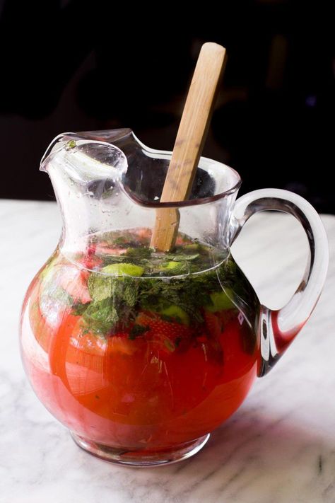 Pitcher Strawberry Mojitos Strawberry Mojito Recipe Pitcher, Strawberry Mojito Pitcher, Titos Vodka Recipes, Strawberry Mojitos, Mojito Recipe Pitcher, Mojito Pitcher, Strawberry Mojito Recipe, Hey Bartender, Strawberry Mojito