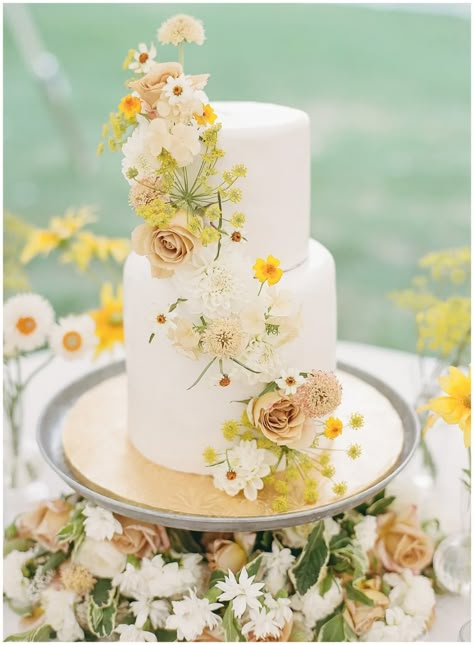 40+ Summer Wedding Cake Inspiration & Ideas | OneFabDay.com Yellow Cake Wedding, Wedding Cakes Yellow, Pale Yellow Wedding Cake, Wedding Cake Flower Decoration, Wildflower Wedding Cake Simple, Wedding Cake Yellow Flowers, White And Yellow Cake, Simple Wedding Cake With Flowers, Neutral Summer Wedding