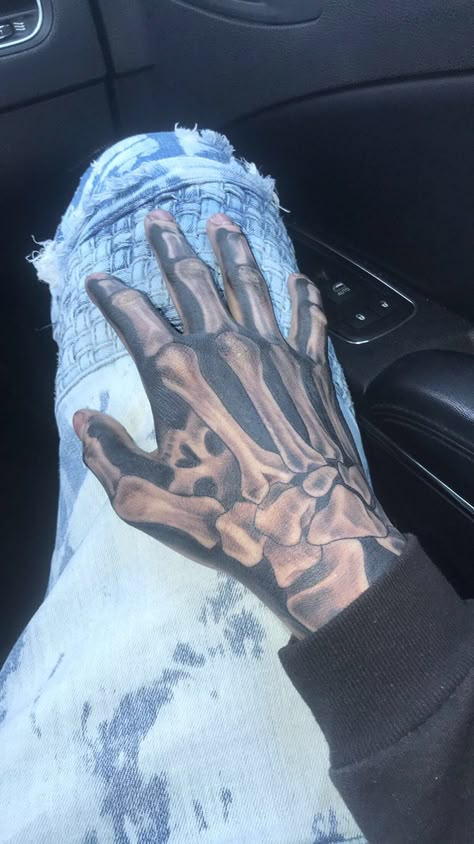 Skeleton Tattoo For Men, Skelton And Hand Tattoo, Trap Tattoos Men Hand, Hand Tattoos For Guys Men Design, Skeleton Tattoo Hand Men, Rare Tattoos Men Sleeve, Hand Tattoos For Black Men, Skeleton Hand Tattoos For Guys, Black Men Hand Tattoos