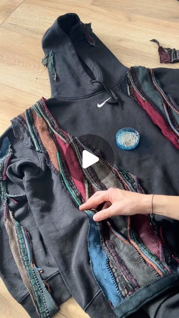 102K views · 5K likes | Rippedndripped on Instagram: "Watch me save these Coogi scraps from the bin 🗑️  . .  . . . . . . . . . . . . . . . . . . . . . . #reworkedclothing #reworkedclothes #reworkedfashion #1of1 #vintagenike #nikevintage #reworkedhoodie #nikesecond #nikethrift #reworked #upcycle #upcycled #upcycleclothing #upcycledfashion #upcyclefashion #smallbusiness #howto #diy #lifehacks #crafts #coogi #coogisweater" Upcycled Hoodie Sweatshirt Refashion, Upcycle A Hoodie, Reworking Sweater, Rework Sweatshirt, Old Hoodie Diy Upcycle, Upcycle Wool Sweaters, Reworked Sweater, Sweatshirt Refashion Remake, Sweatshirt Upcycle