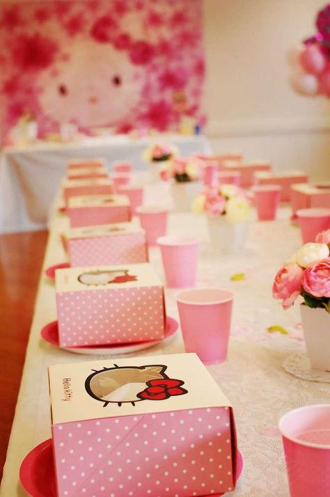 Elizabeth's Hello Kitty Birthday Party | CatchMyParty.com Hello Kitty Party Games, Hello Kitty Table Decorations, Sanrio Birthday Party Decorations, Hello Kitty Birthday Party Decorations, Hello Kitty Favors, Hello Kitty Invitation, Birthday Party Ideas Themes, Hello Kitty Party Favors, Kitty Birthday Party Ideas