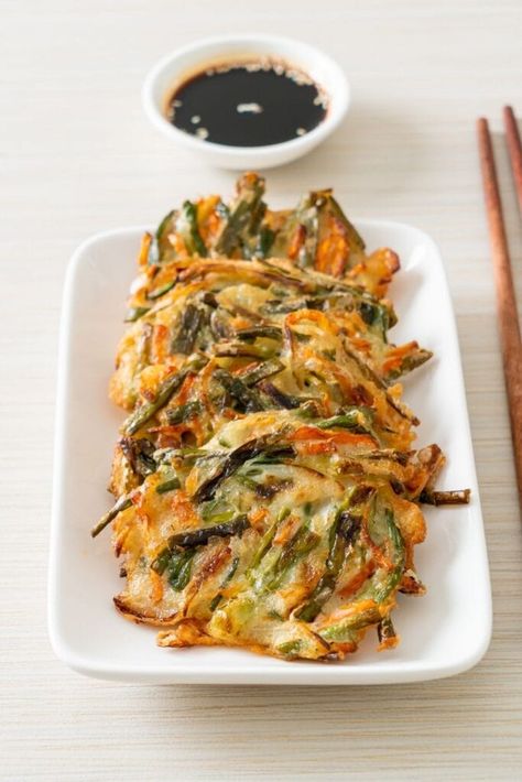 Add some excitement to your meals with these Korean cabbage recipes! From slaw to pancakes to kimchi, you won't be able to resist these dishes. Thai Cabbage Recipes, Korean Cabbage Side Dish, Cabbage Korean Recipes, Korean Cabbage Slaw, Korean Kimchi Pancake, Korean Cabbage Pancake, Korean Meals Healthy, Korean Recipes Healthy, Korean Cabbage Recipes