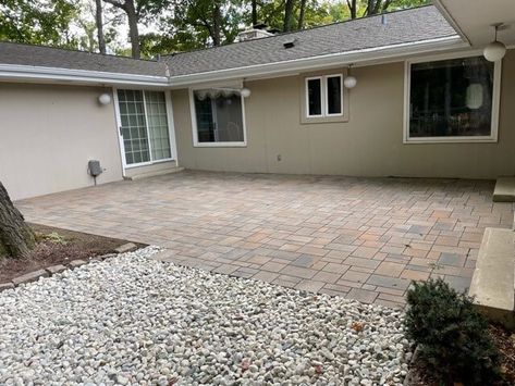 Stone paver patio with gravel walkway Paver Patio With Gravel, Pergola Fire Pit, Stone Paver Patio, Retaining Wall Construction, Gravel Walkway, How To Install Pavers, Outdoor Gathering Space, Patio Pergola, Deck With Pergola