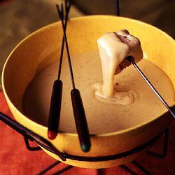 Classic Swiss Fondue Recipe | SAVEUR Cheddar Fondue, Swiss Fondue, Abbotsford Bc, Fondue Party, Country Bread, Fondue Recipes, Dipping Sauces, Favorite Dips, Fine Cooking