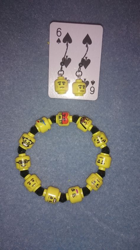 I had a bunch of broken Lego Minifigures, even though some were missing an arm and a leg it seemed a shame to throw them away so I decided to have a go at making an elasticated bracelet and matching pair of quirky matching earrings. Mf Doom Bracelet, Unhinged Bracelet Ideas, Lego Bracelet, Lego Jewelry, Diy Sale, Diy Kandi Bracelets, Diy Kandi, Lego Diy, Lego Craft