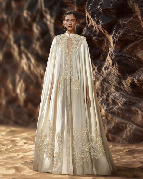 ​Our triple georgette kaftan, adorned with a cascade of silver and gold embellishments, is a testament to exquisite craftsmanship. ​​ #SaiidKobeisy​​ #Kaftan​ #HauteCouture Royal Dinner, Georgette Kaftan, Saiid Kobeisy, Muslim Evening Dresses, Kaftan Designs, Kaftan Style, Exquisite Gowns, Gold Embellishment, Bridal Inspo