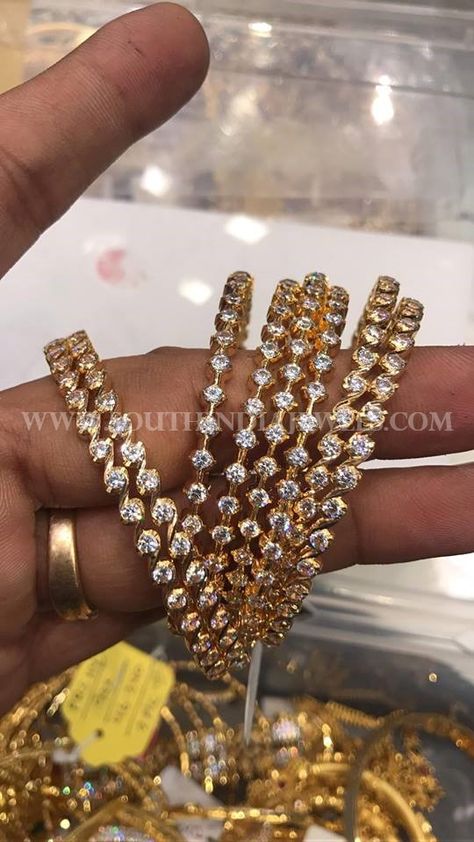 Beautiful 22k gold bangle studded with single row of white stones. Approximate weight is 80 grams. For inquiries please contact the seller below. Seller Name : Premraj Shantilal Jain Jewellers Address : POT MARKET Opp BATA Rp road,Hyderabad, India 500025. Contact No : 9700009000, 9951000005 Website : http://premshantijewels.blogspot.in/ Facebook : https://www.facebook.com/premrajshantilaljainjewellers/ Related Posts50 Grams Gold … White Stone Bangles Gold, Stone Bangles Gold, White Stone Bangles, Premraj Shantilal Jain Jewellers, 22k Gold Bangles, Stone Bangles, Gold Bangle Set, Diamond Wedding Jewelry, White Stones