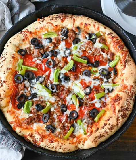 Skillet pizza in a cast iron skillet with pepperoni, sausage, olives, peppers. Pizza In A Skillet, Skillet Pizza Cast Iron, Breakfast Pizza Cast Iron Skillet, Iron Skillet Pizza Deep Dish, Skillet Pizza Recipe, Cast Iron Pepperoni Pizza, Cast Iron Skillet Pizza, Cast Iron Skillet Recipes Dinner, Cast Iron Pizza