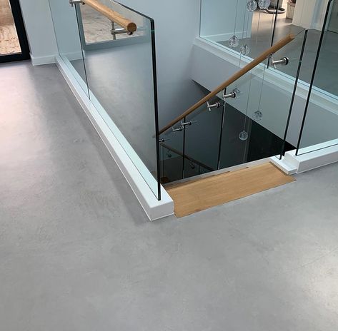 The entire ground floor of this modern, new-build house was finished in Microtopping®, Beige Grey. Subtle movement in the aesthetic was achieved with a particular choice of micro cement powders and over-troweling for greater smoothness but still leaving a little texture. The sealer was Ideal PUWB Easy with its satin matt finish. Micro Cement Floor, Micro Cement, Smooth Concrete, Build House, Wood Stairs, Cement Floor, Concrete Floor, Concrete Floors, New Builds