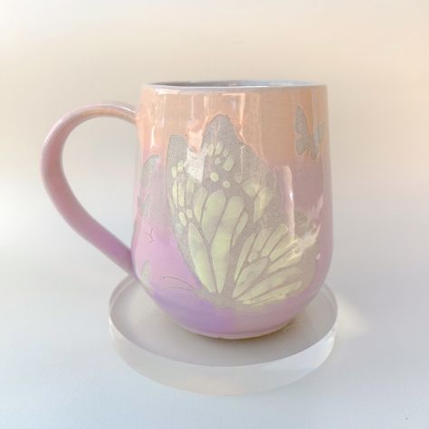 Order by November 30th to get your order in time for Christmas  🦋 The ombré ceramic butterfly mug is a delightful and handcrafted piece that makes a perfect gift for butterfly enthusiasts, teachers, or anyone who appreciates unique ceramic pottery. With its charming Monarch butterfly design, this handmade mug adds a touch of whimsy and elegance to your daily coffee or tea routine. Crafted with care in the USA, it combines artistry and functionality, making it a fun and stylish addition to your Colored Slip Pottery, Wheel Thrown Mugs, Pottery Butterfly, Glazing Pottery, Ceramic Butterfly, Office Party Gifts, Butterfly Mug, Ceramics Pottery Mugs, Colorful Cottage