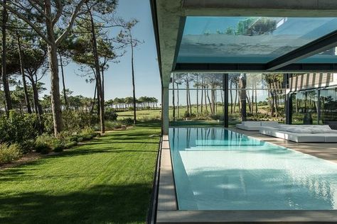 A Pool With a Glass Bottom Hovers Over Another at a House in the Portuguese Riviera - Photo 7 of 12 - Glass Bottom Pool, Backyard Pool House, Modern Pool House, Piscina Interior, Outdoor Remodel, Casas Coloniales, Modern Pools, Wood Patio, Indoor Swimming Pools