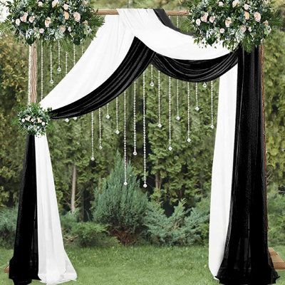 Wedding Arch Drapes: 100% Polyester, high quality sheer chiffon material, well-distributed and fine workmanship. Curtain Color: Black, Size per Panel: 28.7" W x 212.6" L | Le Prise™ Sheer Curtain Panels Polyester in Black, Size 212.6 H in | Wayfair | Home Decor Black And White Wedding Flowers Arch, Tulle Wedding Arch, Black And White Wedding Backdrop Ideas, Wedding Arch Black And White, Black And Gold Wedding Arch, Black And White Wedding Arch Ideas, Black And White Wedding Arch, Black Backdrop Wedding, Black And White Wedding Backdrop