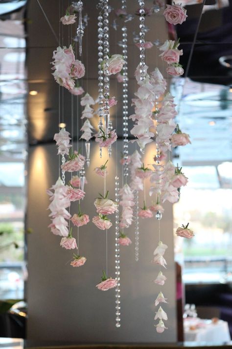 Flower Garland Bedroom Ceiling, Hanging Flowers Ceiling Diy, Hanging Flowers Installation, Ceiling Floral Decor, Spring Dance Decorations, How To Hang Flowers From Ceiling, Flowers On Ceiling, Flower Ceiling Diy, Flowers Hanging From Ceiling