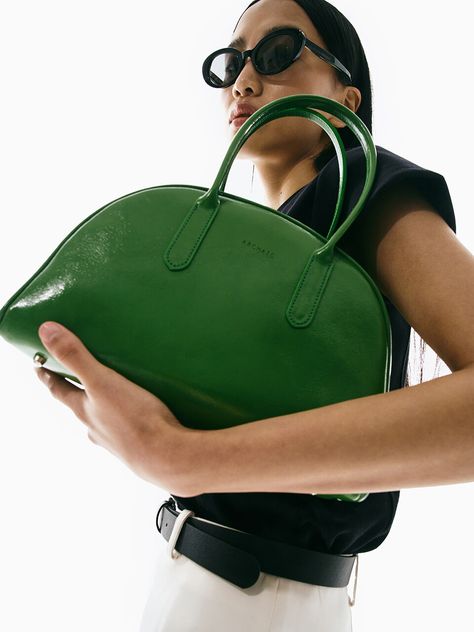 Editor's NotesARCHAIC's bags are versatile and perfect for everyday wear.- Half-moon shaped eco leather bowling bag- Attractive soft texture and refined luster- Spacious interior space- Zipper pocket added practicalityMeasurements(in.)One size- Size: 10.63 in. (W) * 7.09 in. (H) * 3.94 in. (D)*There may have slight error depending on the measurement method.Composition & Care- 80% Polyurethane, 20% Polyester- Dry cleaning at a specialized laundry service is recommended- When washing with wate Teapots Unique, Bowling Bag, Bowling Bags, Laundry Service, Moon Shapes, Classic Mini, Soft Texture, Men Shoes Size, Green Bag