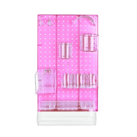 The pegboard organizer kit includes: 1 pc. 13.5" x 22" perforated plastic pegboard wall panel (different color options available), 2 pcs. 2” Clear Polycarbonate Hooks, 1 pc. 3” Dia. Cup, 1 pc. 4” Dia. Cup, 1 pc. 3 Cup Tray, 1 pc. 11.75”W x 5”D Acrylic Headband Holder, 1 pc. 4” Cube Bin, 1 pc. Half Round Bar, 1 hardware pack (4 pcs. 2” Dry Wall Screws with Anchors) Organize Hair Accessories, Game Remotes, Pegboard Wall, Peg Wall, Pegboard Organization, Point Of Sale Display, Pegboard Accessories, Necklace Bar, Organizing Hair Accessories