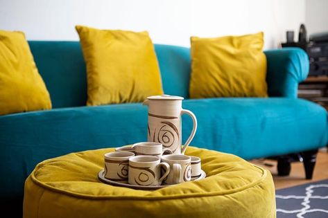 Turquoise Sofa With Yellow Pillows, Teal Furniture Living Room Color Combos, Teal And Ochre Living Rooms, Teal Mustard Grey Living Room, Torquise Blue Color, Teal Sofa Colour Scheme, Teal Blue Sofa Living Room Ideas, Teal Sofa Living Room Color Palettes, Teal And Mustard Living Room