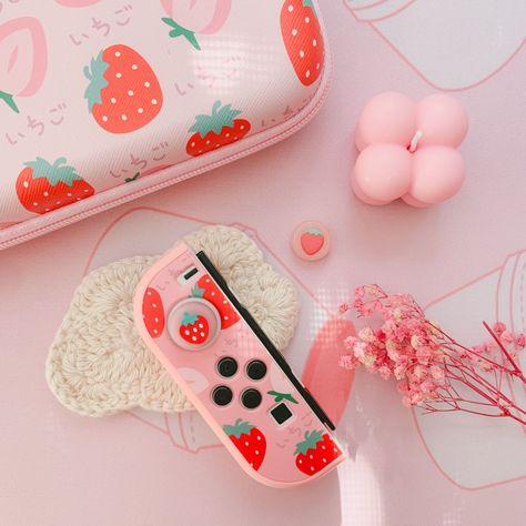 The Ichigo Strawberry design adds personality to your Switch OLED. Perfect for gamer girls who want protection and personal flair. Upgrade your gaming setup with our Ichigo Strawberry 4-in-1 Case Kit now! #NintendoSwitch #SwitchOLED #IchigoStrawberry #GamerGirl #NintendoSwitchAccessories #SwitchCase #SwitchProtection #GamingGear #JoyConCovers #ScreenProtector #PersonalizedGaming #SwitchStyle #GamingCommunity #NintendoGaming #GamingSetup #SwitchGames #SwitchPlayers #GamingAccessories #SwitchLove Strawberry Gaming Setup, Ichigo Strawberry, Gamer Girl Aesthetic, Strawberry Crepe, Gaming Aesthetic, Strawberry Crepes, Gamer Girls, Strawberry Design, Nintendo Switch Accessories