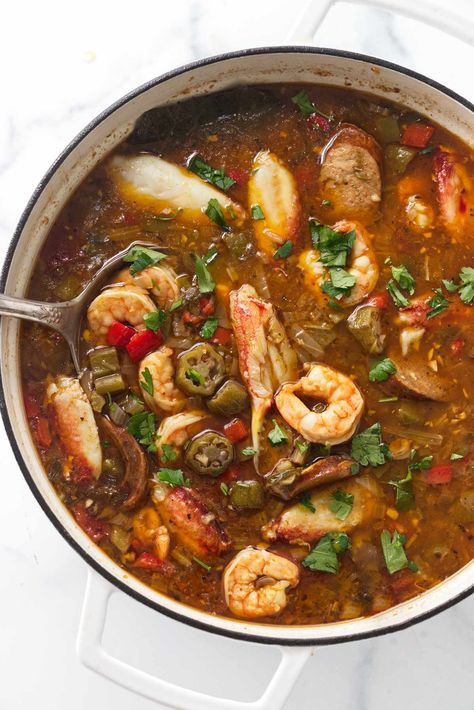 This seafood gumbo recipe brings New Orleans to your kitchen with a mix of tender chicken, fresh seafood, and vibrant spices. Perfect for any occasion, it's a crowd-pleaser that will have everyone asking for seconds. Gumbo Recipe Seafood, Gumbo Recipe Authentic, Seafood Gumbo Recipe Easy, Gumbo Recipe Crockpot, Shrimp Gumbo Recipe, Easy Gumbo, Gumbo Recipe Easy, Seafood Gumbo Recipe, Shrimp Gumbo