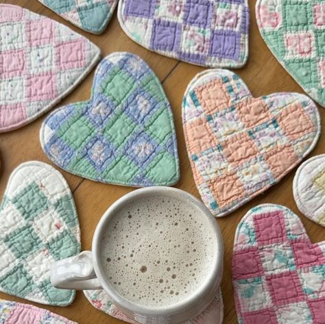 Tami Gray Voth on Instagram: "I’m enjoying some afternoon tea using a new heart coaster I just finished. These are made from an old quilt, lined with fusible fleece and backed with fabric. ☕️ They’ll be sold in sets of two and will be available April 15 between 6-6:30 p.m. EST. #afternoontea #teatime #afternoonteatime #tealover #tea #tealove #coaster #coasters #heartshaped #heart #hearts #oldquilt #vintagequilt #sew #quilt #patchworkquilt #quiltlove #sewing #sewsewsew #sewingtime #sewinglove #repurposed #upcycling #handmadehome #makersgonnamake #maker #simplejoys #simplethingsmadebeautiful #simplethings #handmadewithlove" Old Quilt Crafts Projects, Recycle Old Quilts Ideas, Upcycle Old Quilts, Homemade Gifts Sewing, Repurpose Quilts Ideas, Repurposed Quilts Ideas, Repurpose Old Quilts, Quilt Upcycling, Old Quilts Repurposed Ideas