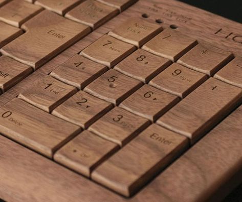 As an eco-conscious individual of the twenty first century, we know you're always on the lookout for new green products. The bamboo keyboard with mouse set is the ideal addition to your already eco-friendly humble abode. Both mouse and keyboard are hand carved from 100% bamboo; bamboo not only grows at an astounding rate but… Wooden Keyboard, Woodworking Software, Take My Money, Gadgets And Gizmos, Custom Woodworking, Cool Tech, Cool Technology, Back To Nature, Cool Stuff