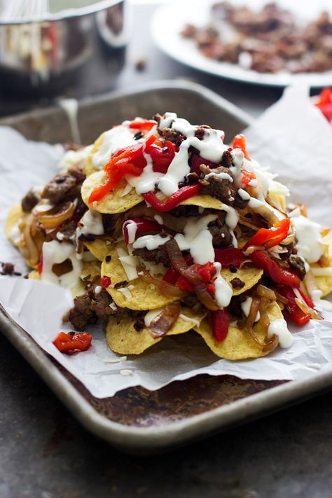 Italian Style Nachos - Layers of spicy italian sausage, roasted red peppers, fontina cheese and a creamy cheese sauce are the spin on a classic nacho! Cheese Sauce Nachos, Provolone Cheese Sauce, Roasted Red Peppers Recipes, Turkey Italian Sausage, Red Pepper Recipes, Fontina Cheese, For Keeps, Nacho Cheese, Provolone Cheese