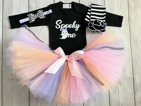 The perfect Spooky One birthday outfit for your little princess! At Strawberrie Rose I create whimsical first birthday and second birthday outfits for baby girls that can also be made to match your little girl's 1st birthday party, 2nd birthday, or cake smash theme! If you would like a different color scheme or tutu theme, please contact me first to discuss. This listing includes your choice of: 1 handmade Spooky One birthday tutu on stretch elastic 1 Spooky One themed bodysuit 1 single hair bow First Boo Day, Birthday Outfit For Baby Girl, Whimsical First Birthday, Spooky One Birthday, Halloween First Birthday, Halloween 1st Birthdays, Ghost Dresses, Spooky One, Glitter Headband