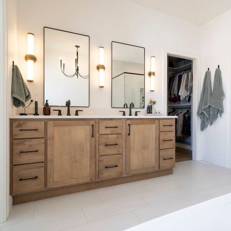 It may be time to refresh your bathroom with trendy materials and design elements, and timeless stained cabinetry. Contact us today to learn more. Showplace Pendleton door style | Maple | Cashew stain . . . #bath #bathroom #bathroomrefresh #bathroomremodel #bathroomvanity #cabinets #showplacecabinetry Maple Cabinet Bathroom, Maple Cashew Cabinets, Wooden Cabinet Bathroom, Natural Wood Bathroom Cabinets, Black And White Kitchen Design, Kitchen Door Styles, Wood Bathroom Cabinets, White Pantry, Black And White Kitchen