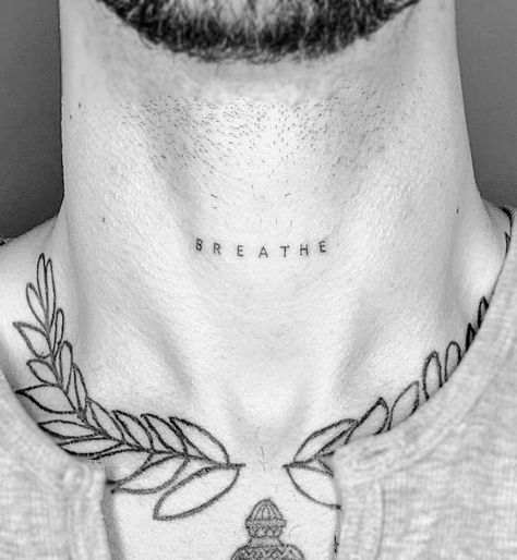 38 Small Meaningful Tattoos That Are Permanent Reminders Word Throat Tattoo, Neck Area Tattoo, Meaningful One Word Tattoos For Men, Small Written Tattoos Men, Single Word Neck Tattoos, Small Meaningful Neck Tattoos, Simple Tattoos Neck, Neck Tattoo Words Men, Neck Writing Tattoo Men